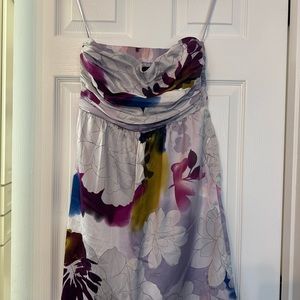 Tubetop floral soft satin knee length dress with ruched pleated bust.